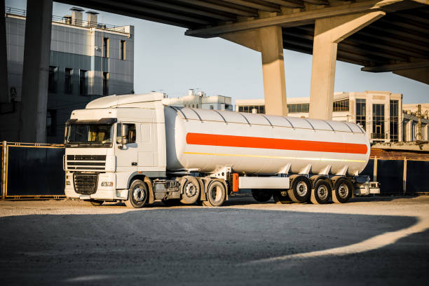 istock Truck with trailer, tank with flammable liquid 1195768263