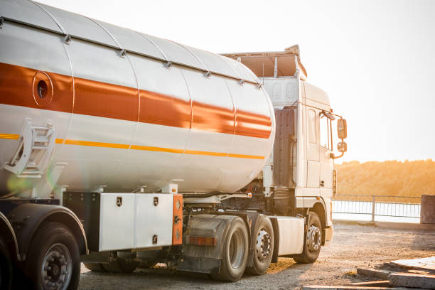 istock Truck with trailer, tank with flammable liquid 1195768797