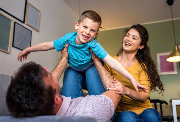 istock Happy family spending quality time at home together. 1195771096