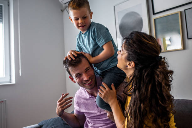 istock Happy family spending quality time at home together. 1195771167