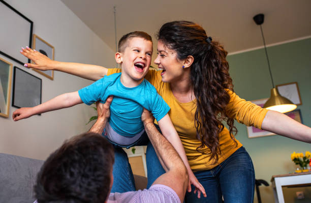 istock Happy family spending quality time at home together. 1195771177