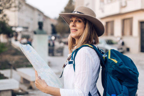 istock Stylish woman going on the trip 1195771958