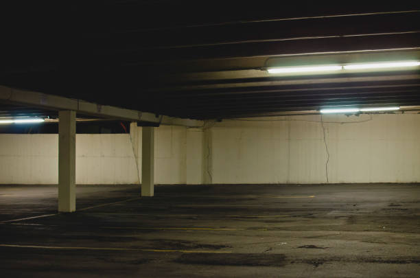 istock Down under the city in the dark garage 1195773435