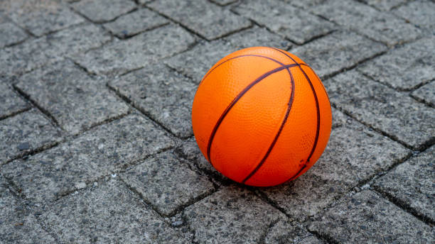 istock Small Basketball on The Road 1195774584