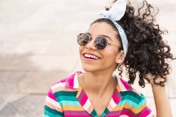 beautiful latin american teenage girl - silence curly hair facial expression female imagens e fotografias de stock