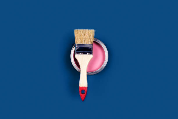 istock Blue background with paint jar and brush. 1195774769
