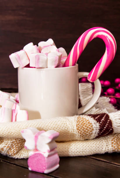 istock A white cup of hot chocolate with pink marshmallows 1195782791