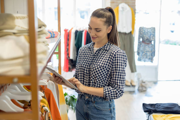 istock Beautiful shop assistant 1195784504
