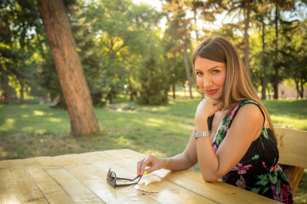 Happy woman smiling looking at camera