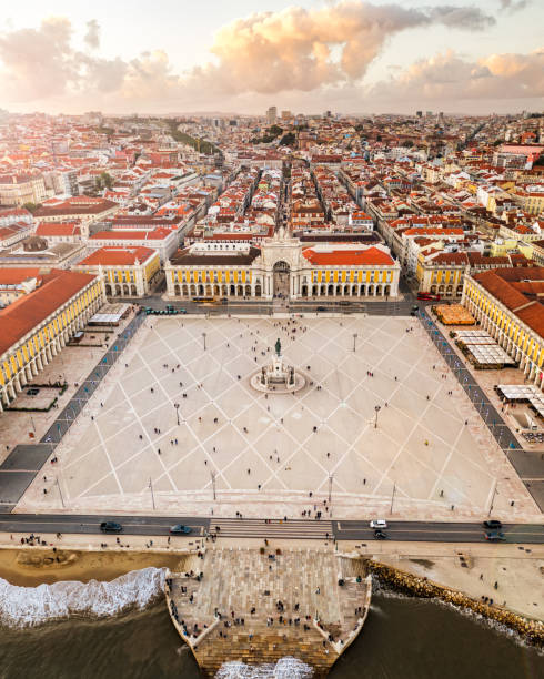 Panorama central commerce square palace, Lisbon, Portugal at sunset, old european city, drone view, vertical air Panorama central commerce square palace terrace, Lisbon, Portugal at sunset, old european city, drone view, vertical air photo baixa stock pictures, royalty-free photos & images
