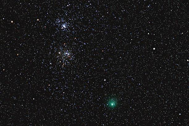 Comet 103/P Hartley amongst the stars of Perseus stock photo