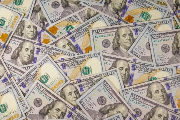 istock Background of american one hundred dollar bills 1195795427