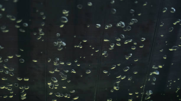 istock Nice abstract light yellow background made from water under glass. Background and texture concept. 1195796781