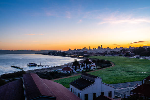 San Francisco Sunrise from Fort Point Photographing the sunrise from the Fort Point, the Golden Gate Bridge, and Crissy Field Overlook in the Presidio. west marin stock pictures, royalty-free photos & images