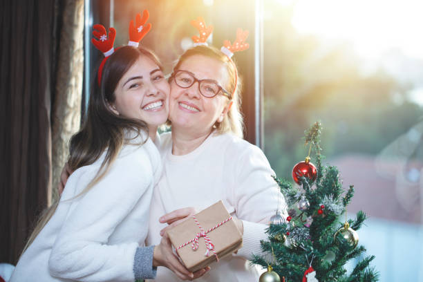 istock Celebrating christmas with christmas gift 1195804811