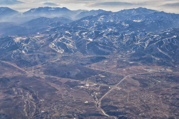 istock Wasatch Front Rocky Mountain Range Aerial view from airplane in fall including urban cities and the Great Salt Lake around Salt Lake City, Utah, United States of America. USA. 1195806204