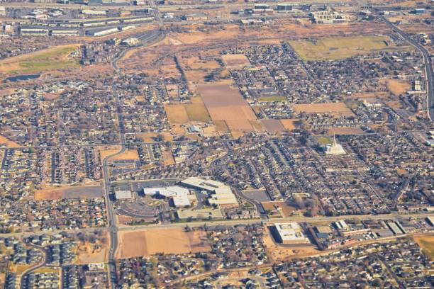 istock Wasatch Front Rocky Mountain Range Aerial view from airplane in fall including urban cities and the Great Salt Lake around Salt Lake City, Utah, United States of America. USA. 1195806981