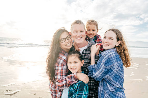 istock Family on the beach 1195807804