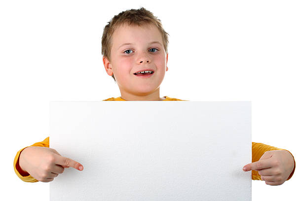 istock Small boy holds blank polystyrene billboard isolated on white 119580812