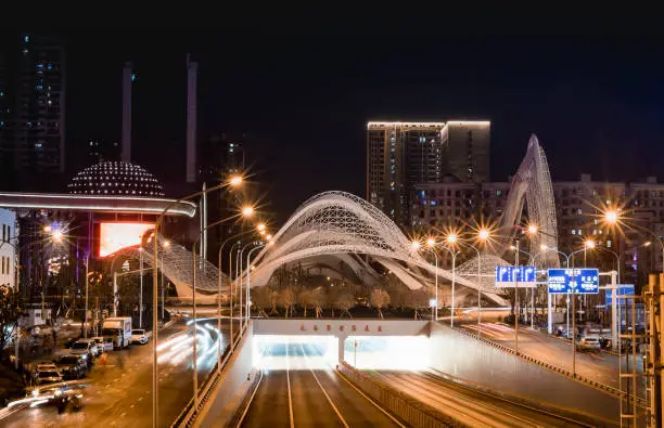 WUHAN, HUBEI/  CHINA - NOV 20 2019: The night cityscape of Optics Valley, Wuhan, This here is the center of financial district. It's located at the center of Wuhan city, Hubei province, China Mainland .