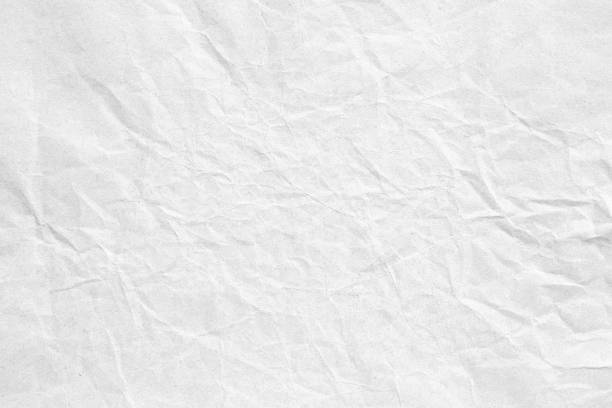 istock Crumpled white grey paper background texture 1195814626