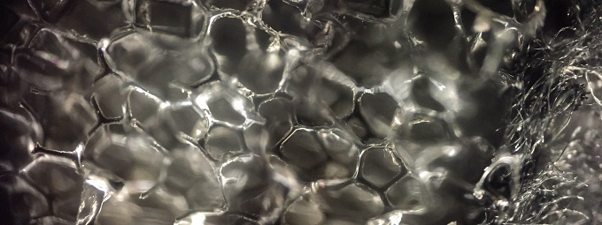 The texture of a facial serum or cosmetic gel. Close-up, macro photography.