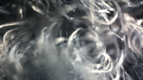 istock black fibers under the microscope 1195816980
