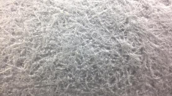 white fibers under the microscope and Micro Fabric Weave