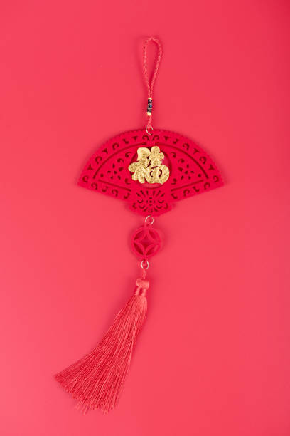 istock Chinese knot on the red background 1195819023