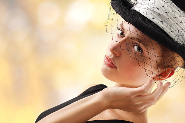 istock elegant young woman 119582171