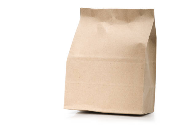 istock Natural brown paper bag on white background with clipping path. 1195828882