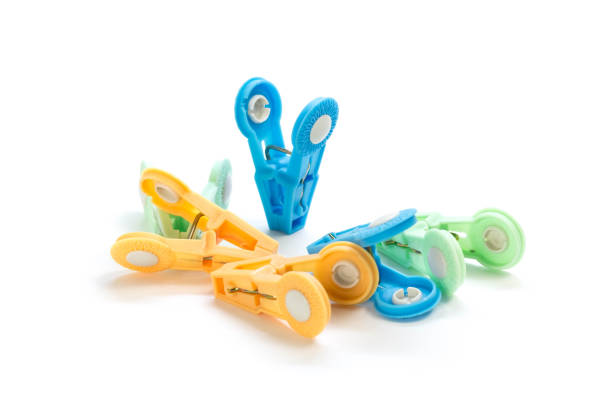 istock Colored clothespins. Close up. Isolated on white background 1195834808