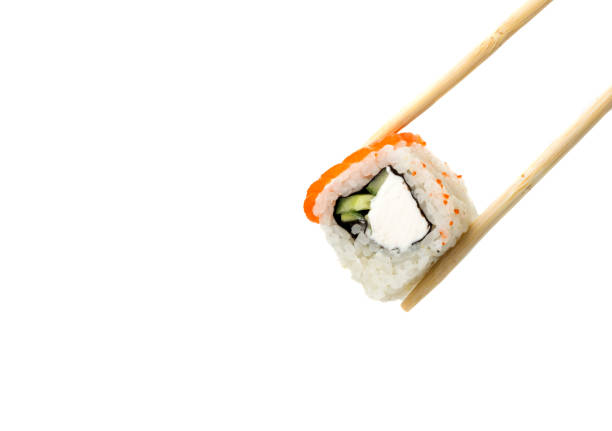 istock wooden sticks holds sushi on a clean white background 1195837578