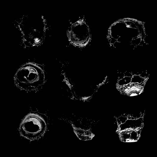 istock Water splashing isolated over a black background. 1195839272
