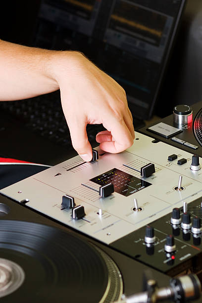 istock Hand of a dj adjusting the crossfader 119584038
