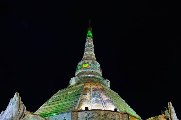 The Jade pagoda in Mandalay Myanmar, Mandalay,Amarapura town.
It is the world's only stupa built entirely of expensive jade, costing more than $800 million and made of 1,500 tons of jade.
The pagoda is about 25 meters high and magnificent.
The emerald pagoda, named Werawsana, was built in 2012 and took three years to complete. It is a wonder of the world.
Every day of the year, countless people come here to see and worship.
These are pictures of the emerald pagoda taken in four directions-east, south, west and north. Amarapura stock pictures, royalty-free photos & images