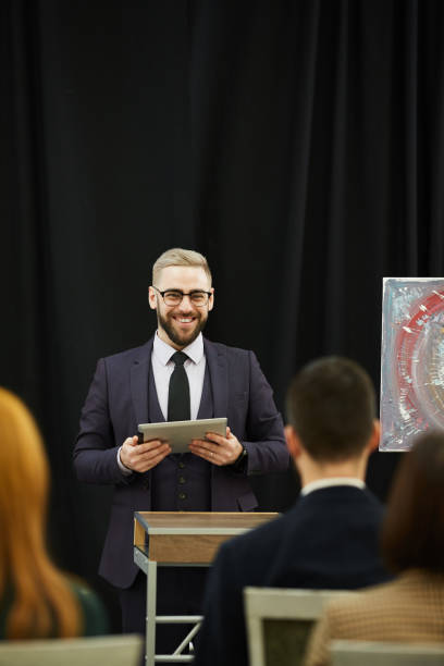 istock Businessman at presentation 1195845058