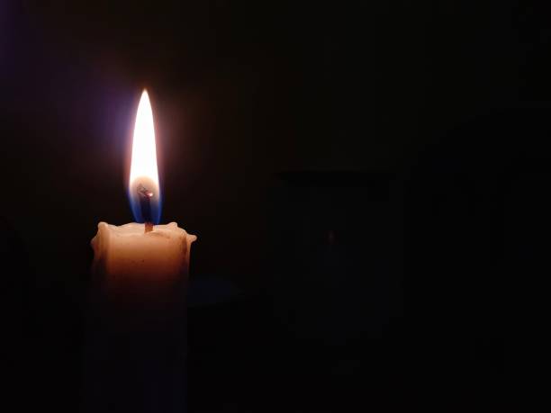istock Candlelight in the dark 1195848589
