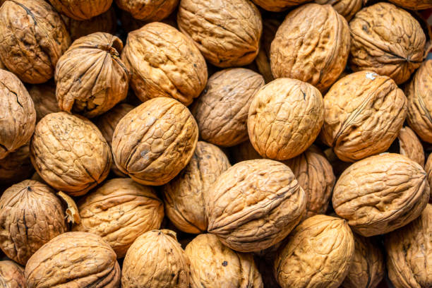 istock A heap of walnuts in a bowl 1195849035