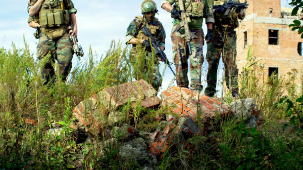 istock Group of people in military uniform 1195849393