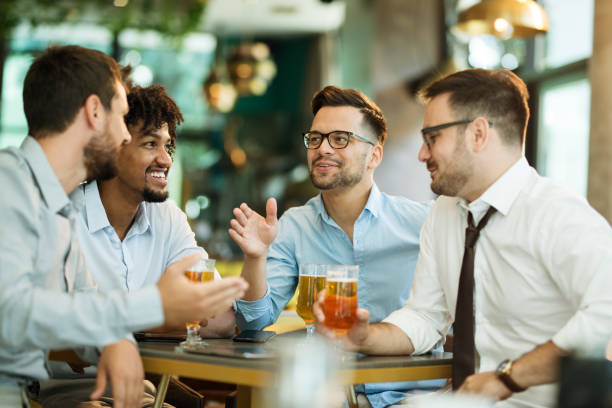 istock Celebrating good business cooperation at the bar 1195851077