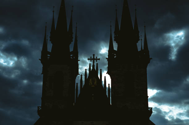 Dark gothic church with dramatic sky in the background in horror or halloween, with copy space. Church of Our Lady before Týn, old time square, Prague.