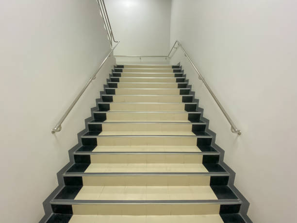 istock stairs with hand railing with white background 1195860037