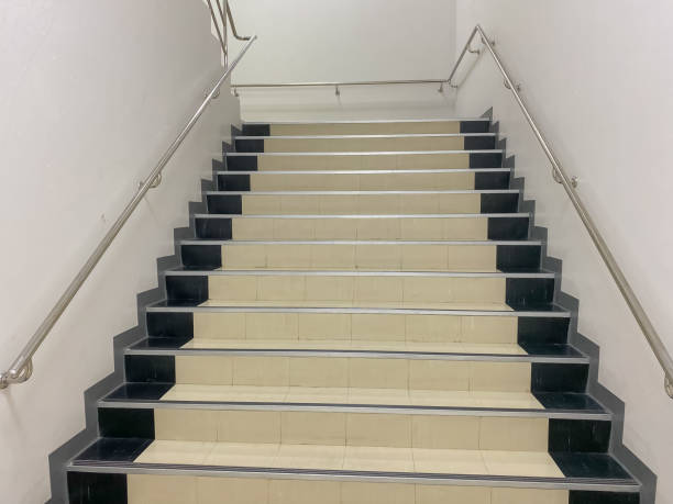 istock stairs with hand railing with white background 1195862229