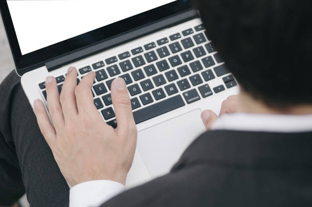 istock Midsection Of Businessman Using Laptop 1195862616