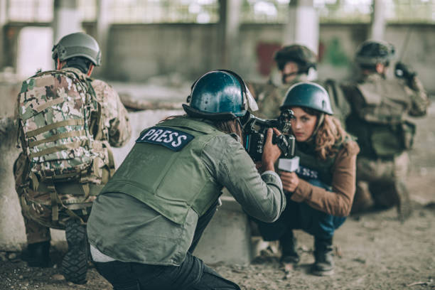 istock War journalists in the war zone 1195868944