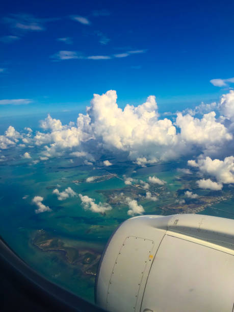 istock airplane view of tropical ocean 1195871607