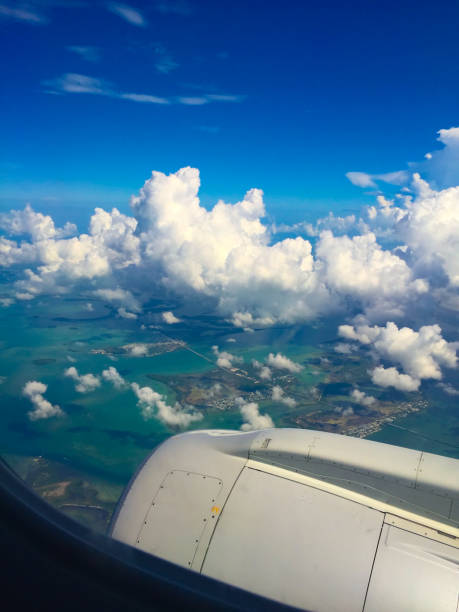 istock airplane view of tropical ocean 1195871616