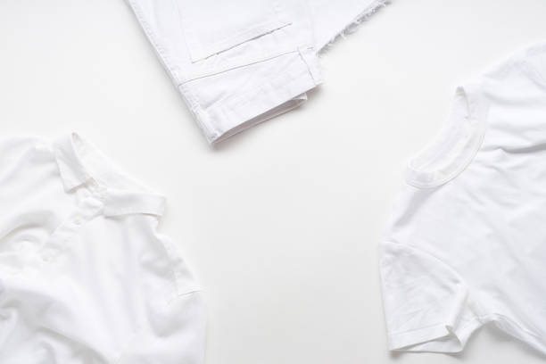 istock White monochromatic flatlay on white background with clothes. Blog design concept 1195876176