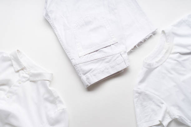 istock White monochromatic flatlay on white background with clothes. Blog design concept 1195876180